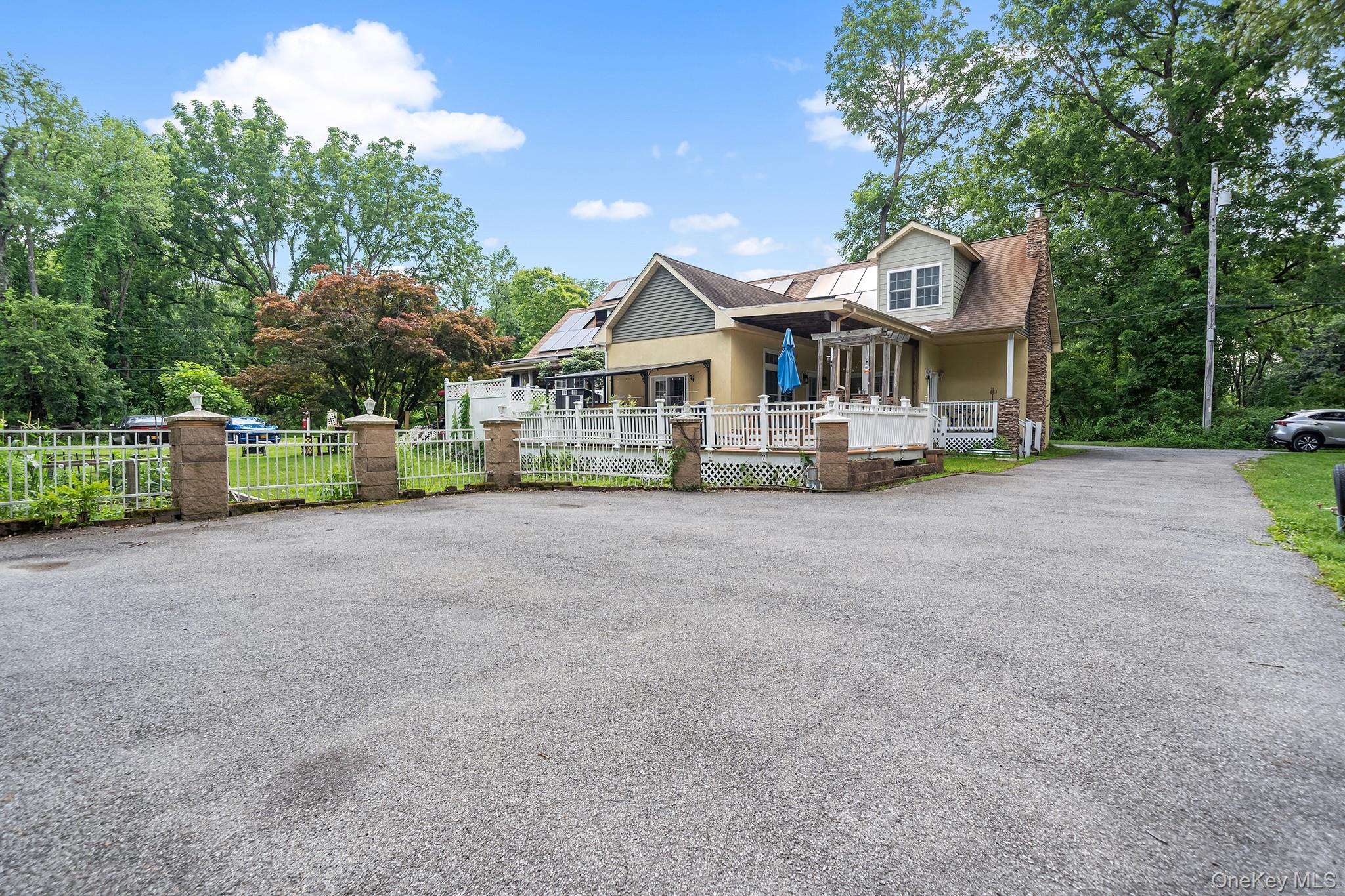 2 Dimiceli Street New Windsor, NY 12553 - Photo 1 of 1 a front view of a house with a yard and garage