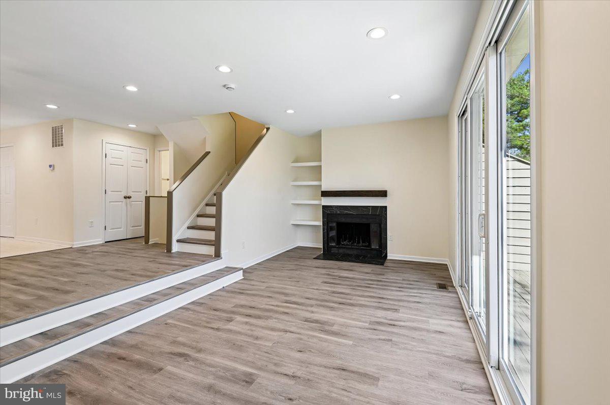 5097 Columbia Road, Unit 16 18 Columbia, MD 21044 - Photo 13 of 65 Living Room w/FP & Built ins