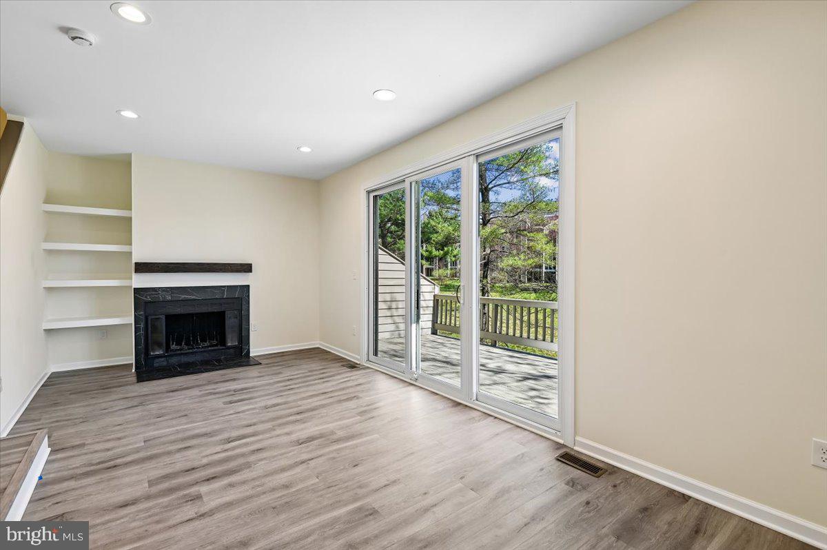 5097 Columbia Road, Unit 16 18 Columbia, MD 21044 - Photo 14 of 65 Sliding Glass Door opening to Deck