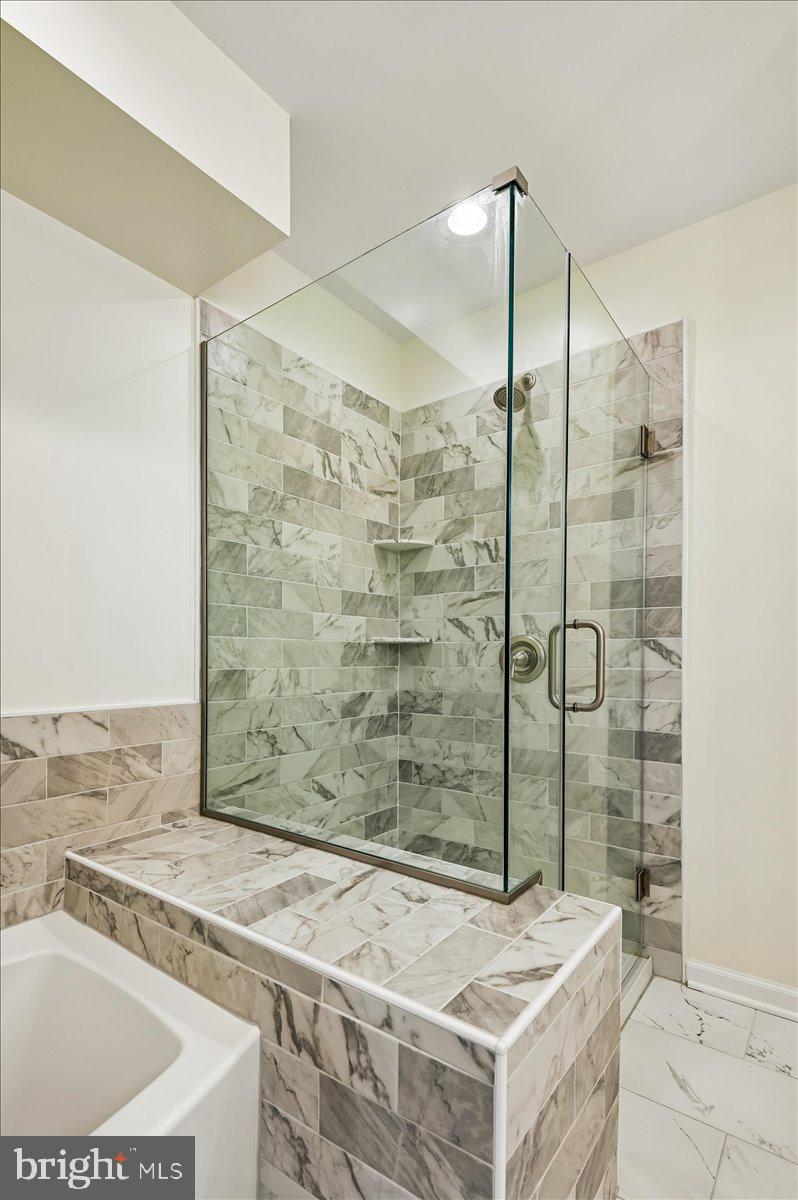 5097 Columbia Road, Unit 16 18 Columbia, MD 21044 - Photo 27 of 65 Glass enclosed shower