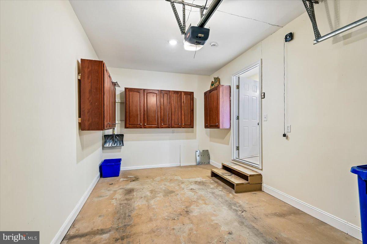 5097 Columbia Road, Unit 16 18 Columbia, MD 21044 - Photo 47 of 65 Garage with storage cabinets