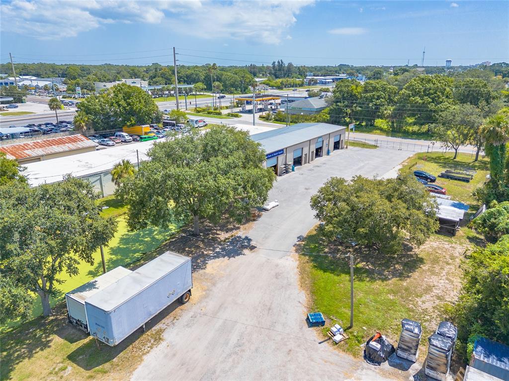 135 Clearlake Road Cocoa, FL 32926 - Photo 21 of 22 an aerial view of a city with lots of residential buildings ocean and mountain view in back