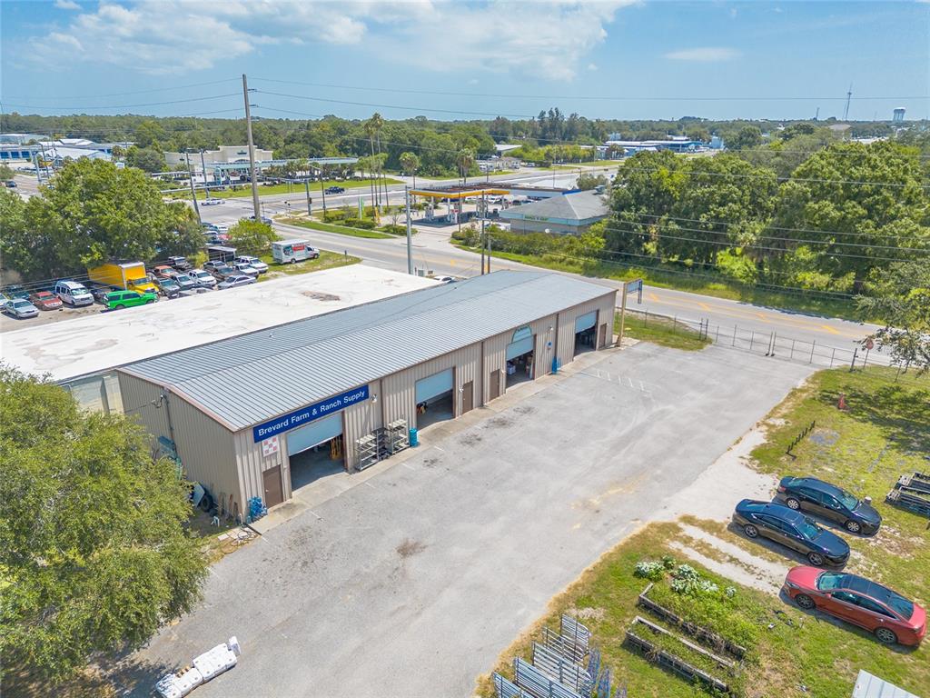 135 Clearlake Road Cocoa, FL 32926 - Photo 4 of 22 a view of a city from a terrace