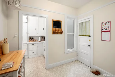 a bedroom with a bed and furniture