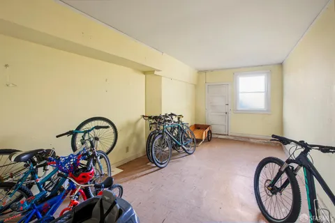 a view of an bike storage and utility room