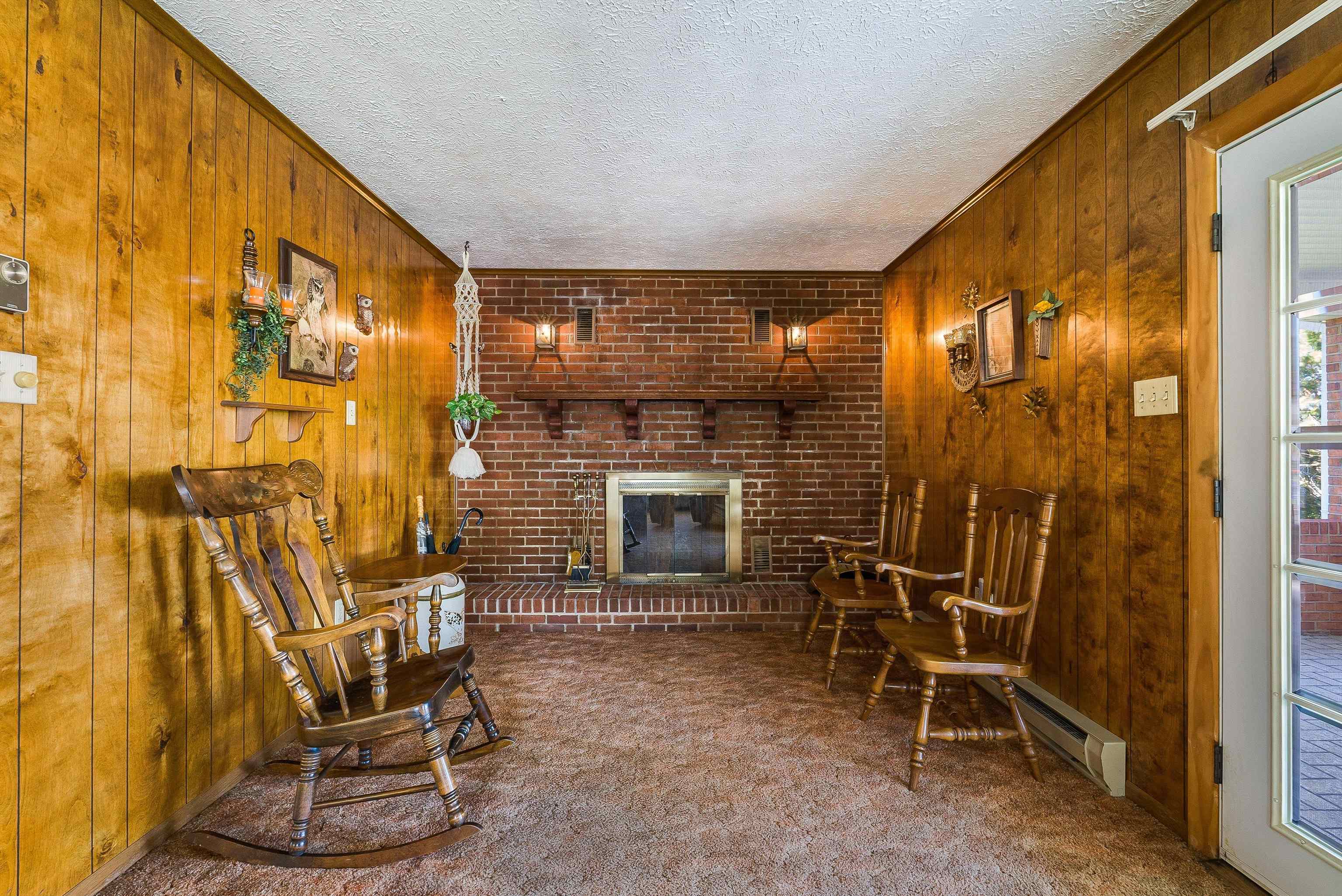 3430 Oak Ridge Road Mount Crawford, VA 22841 - Photo 21 of 59 a living room with furniture and a fireplace
