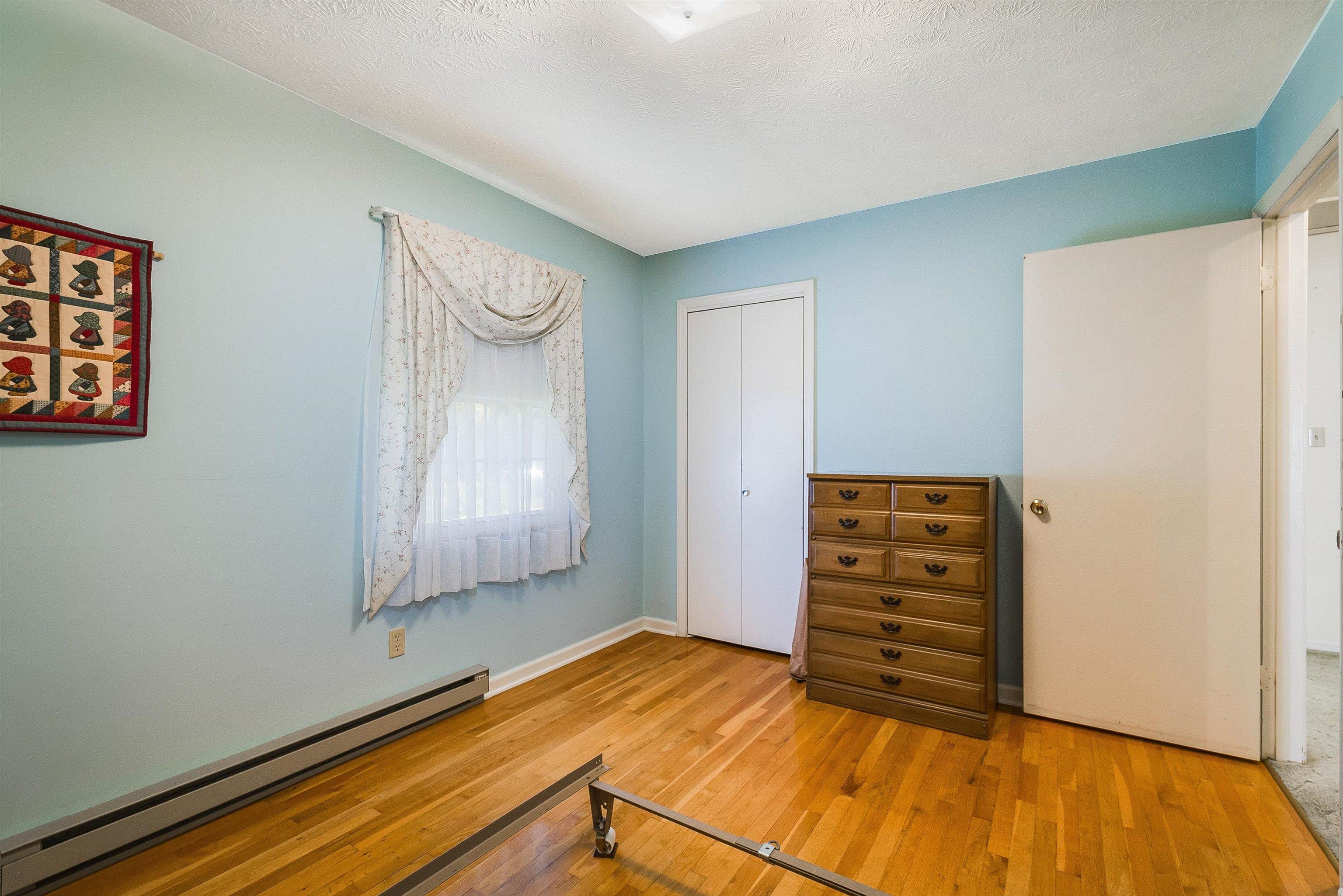 3430 Oak Ridge Road Mount Crawford, VA 22841 - Photo 24 of 59 a view of empty room with wooden floor