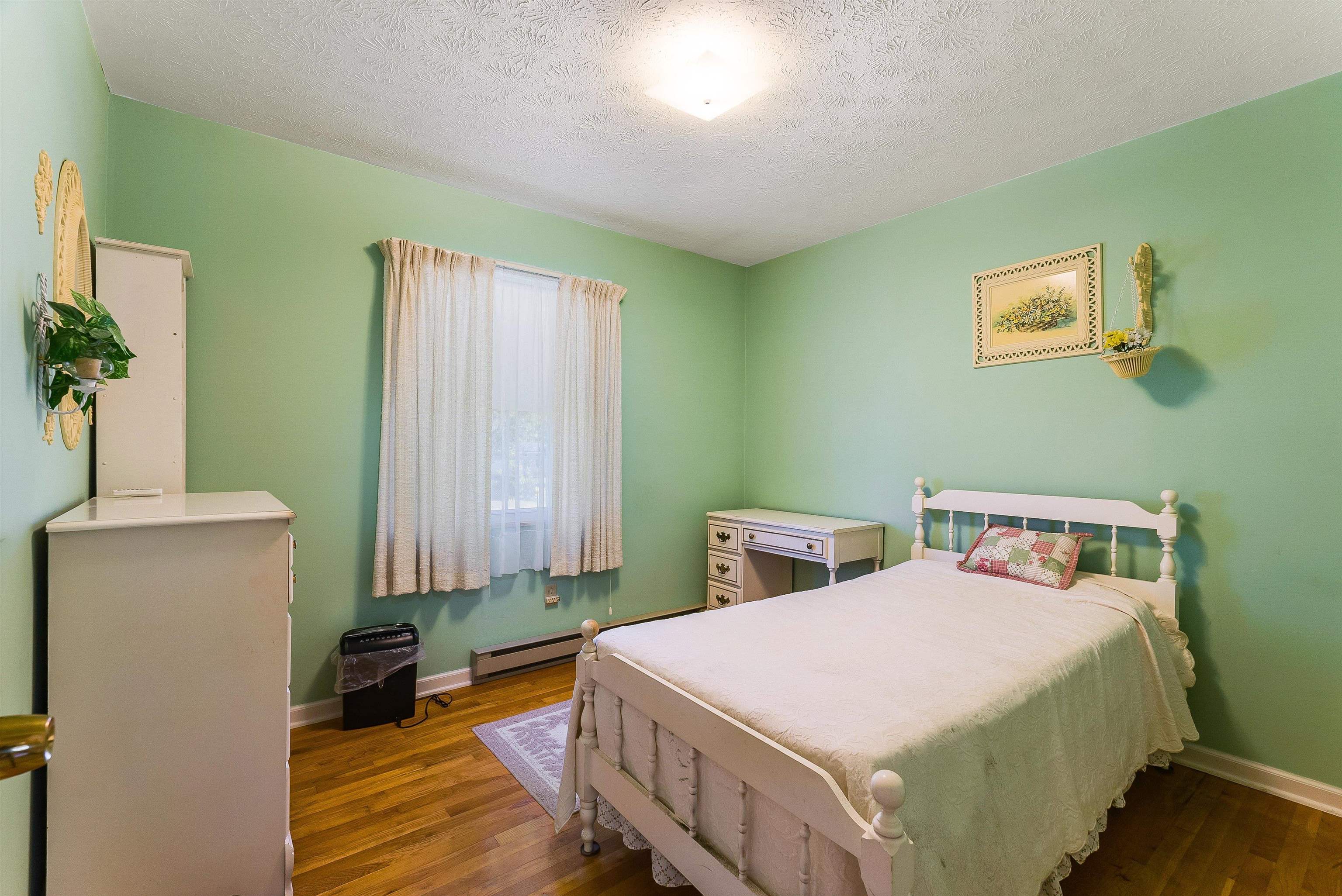 3430 Oak Ridge Road Mount Crawford, VA 22841 - Photo 25 of 59 a bedroom with a bed and a table in it