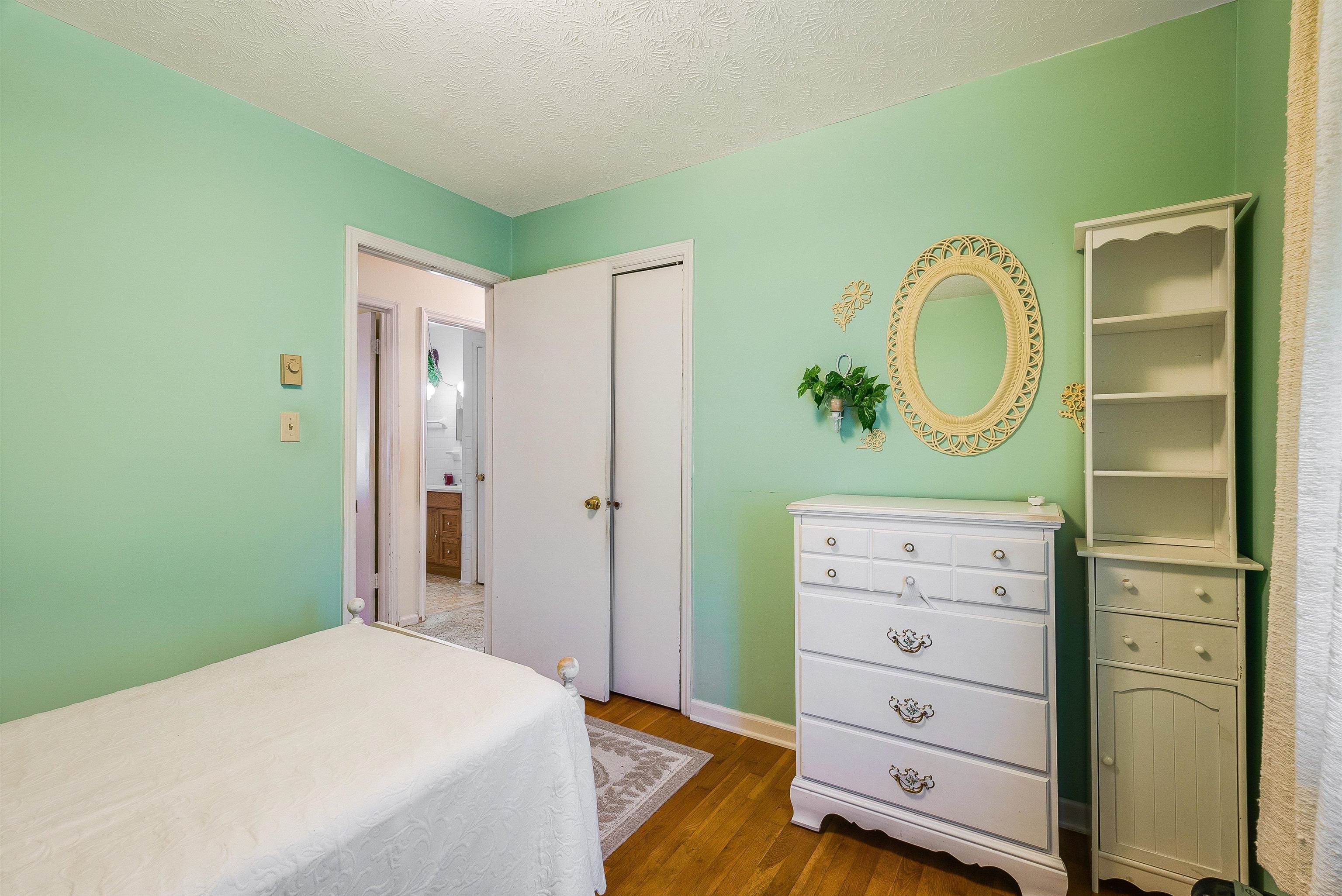 3430 Oak Ridge Road Mount Crawford, VA 22841 - Photo 26 of 59 a bedroom with a bed and a dresser