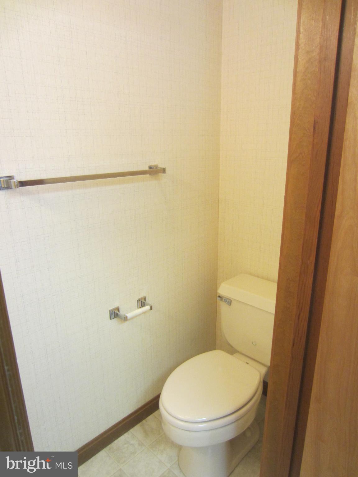 1008 Sumac Circle Salisbury, MD 21804 - Photo 11 of 21 a white toilet sitting next to a shower