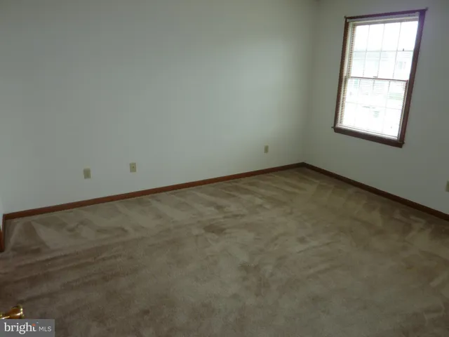 an empty room with closet