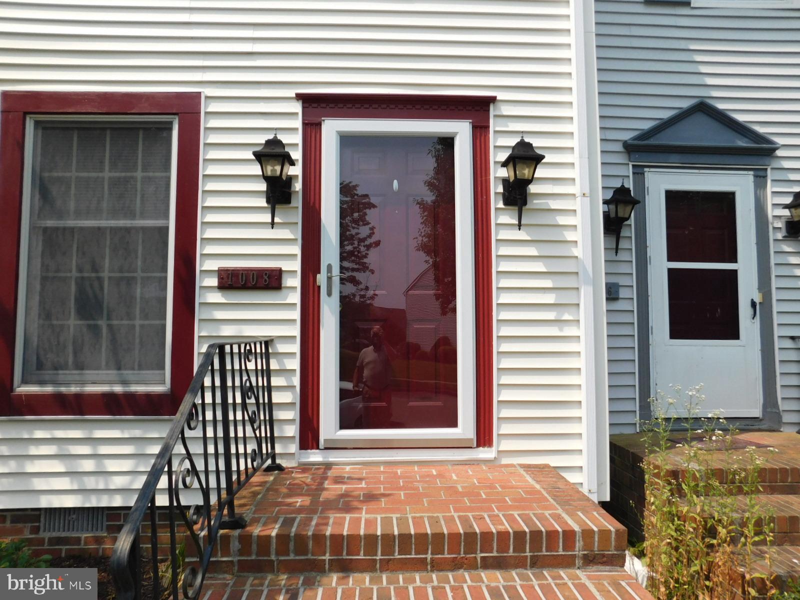 1008 Sumac Circle Salisbury, MD 21804 - Photo 2 of 21 a front view of a house with a yard