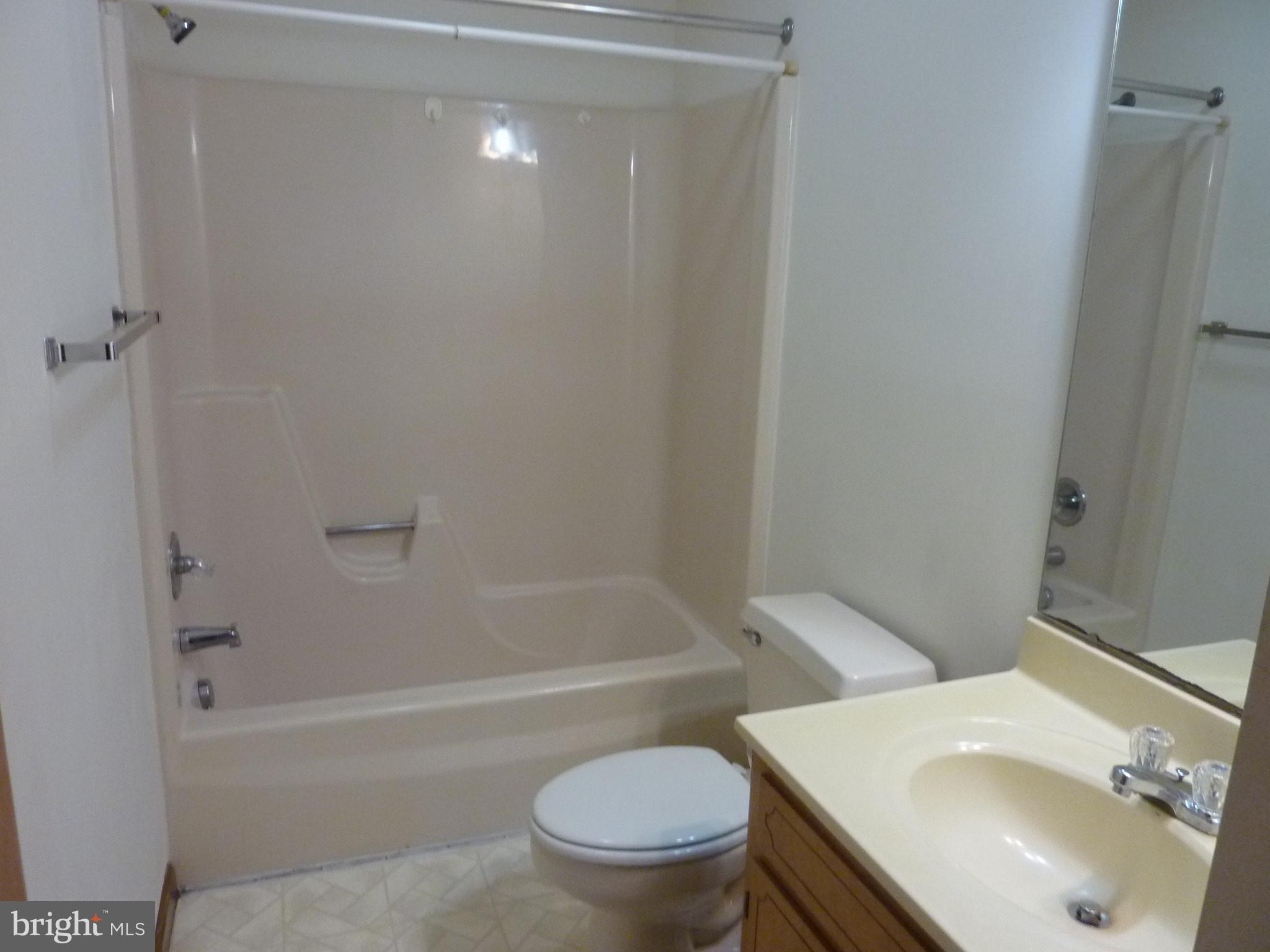 1008 Sumac Circle Salisbury, MD 21804 - Photo 21 of 21 a bath room with a sink a toilet and a bath tub