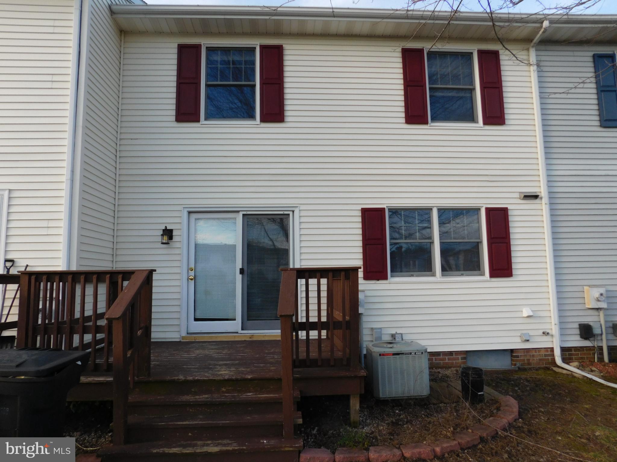 1008 Sumac Circle Salisbury, MD 21804 - Photo 3 of 21 a view of a house with a table and chairs