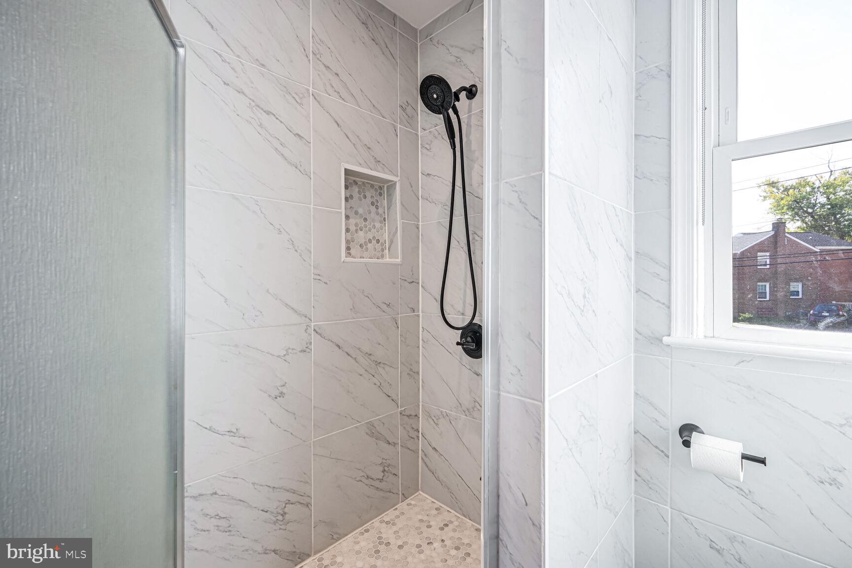 807 Lanark Way Silver Spring, MD 20901 - Photo 11 of 39 a bathroom with a shower