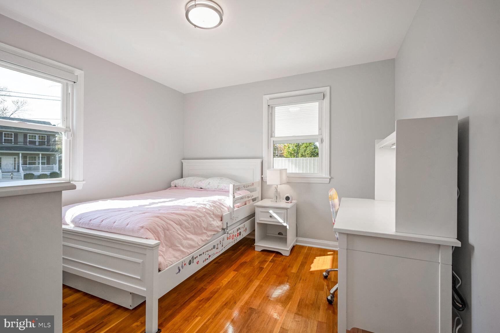 807 Lanark Way Silver Spring, MD 20901 - Photo 12 of 39 a bedroom with a bed and a window