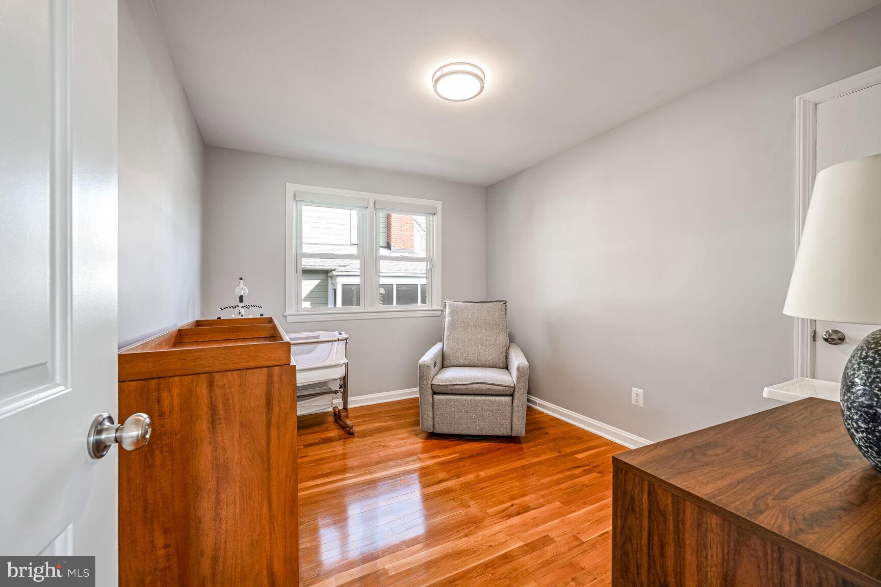 807 Lanark Way Silver Spring, MD 20901 - Photo 14 of 39 a living room with furniture and a wooden floor