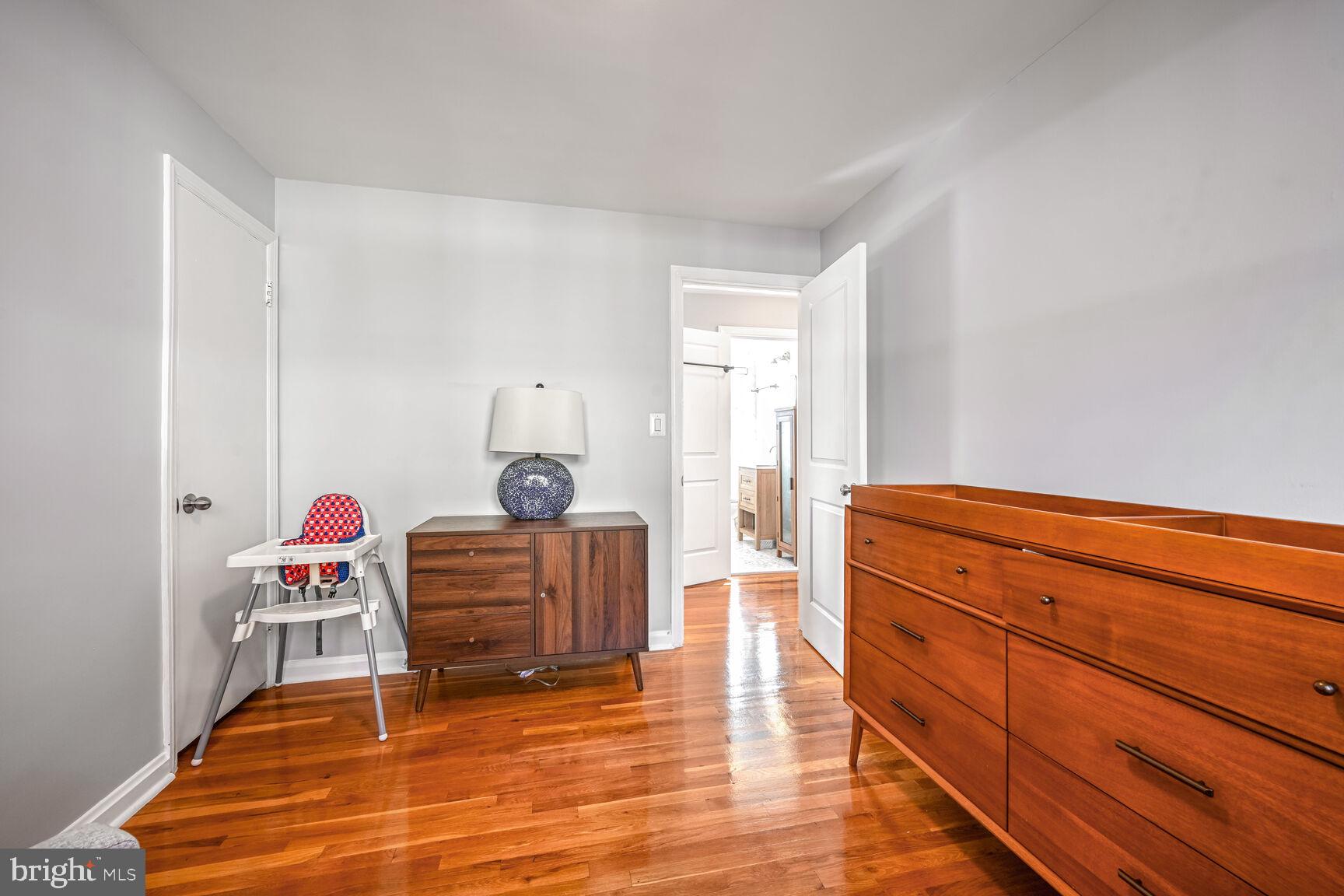 807 Lanark Way Silver Spring, MD 20901 - Photo 15 of 39 a living room with furniture and a wooden floor