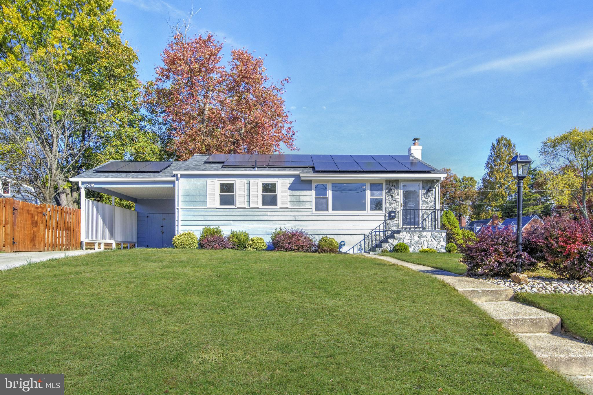 807 Lanark Way Silver Spring, MD 20901 - Photo 2 of 39 a view of a house with a yard and potted plants