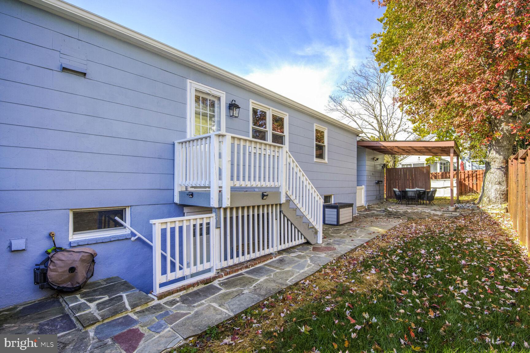 807 Lanark Way Silver Spring, MD 20901 - Photo 24 of 39 a view of a house with backyard and sitting area