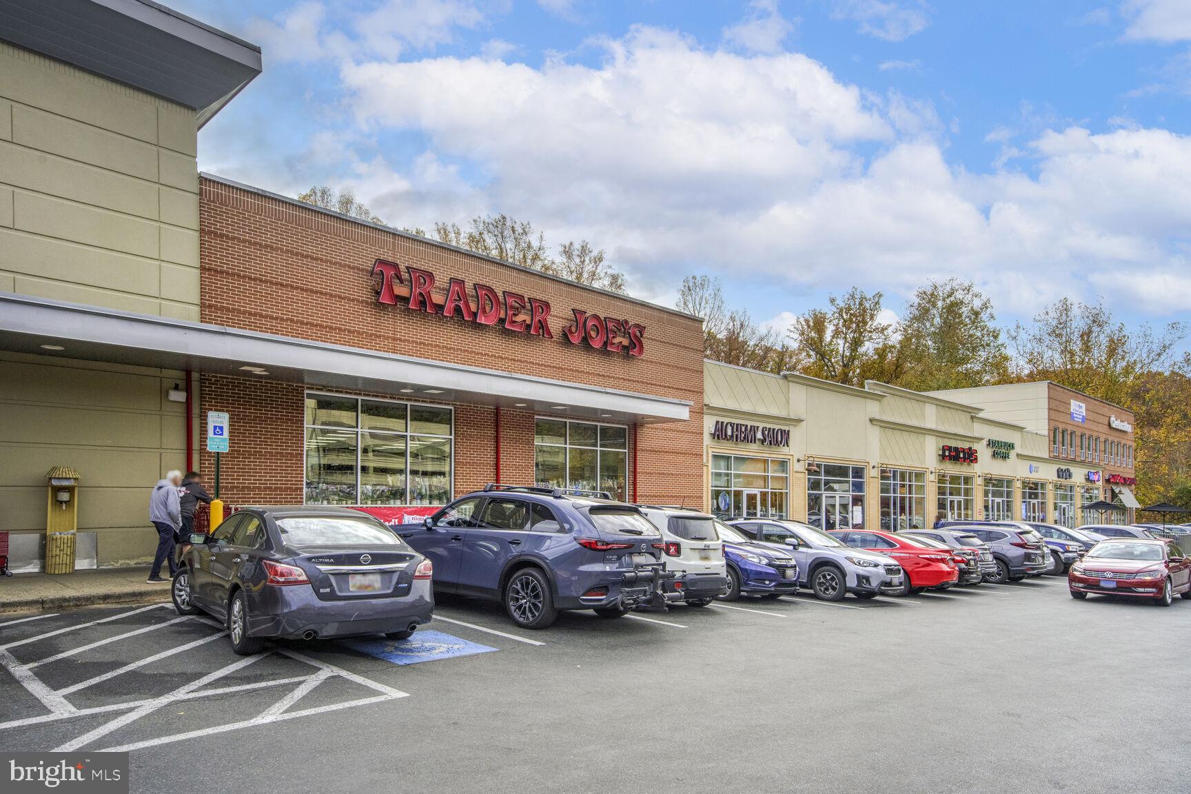 807 Lanark Way Silver Spring, MD 20901 - Photo 32 of 39 a view of a cars park in front of a building
