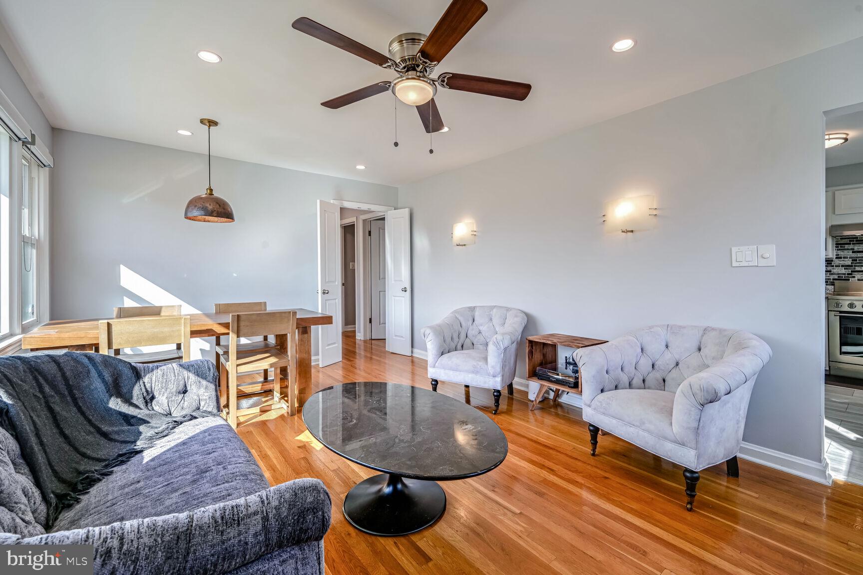 807 Lanark Way Silver Spring, MD 20901 - Photo 4 of 39 a living room with furniture and a wooden floor