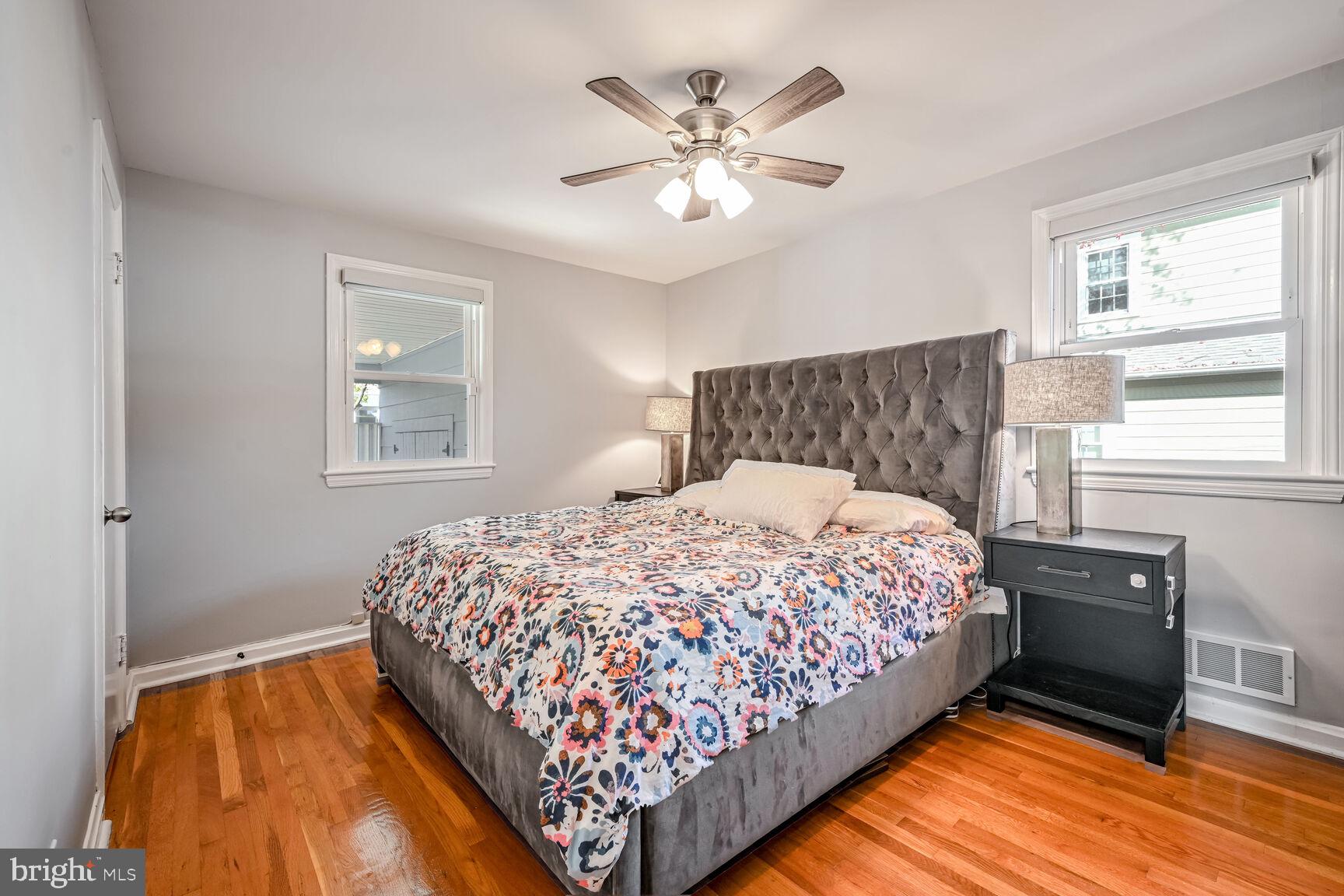 807 Lanark Way Silver Spring, MD 20901 - Photo 8 of 39 a bedroom with a bed and a window