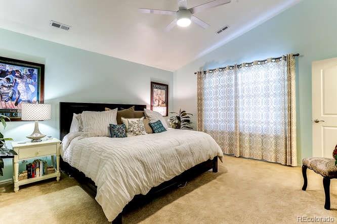 4068 Desert Ridge Circle Castle Rock, CO 80108 - Photo 15 of 25 a bedroom with a bed and a window
