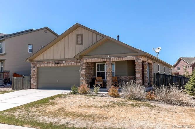 4068 Desert Ridge Circle Castle Rock, CO 80108 - Photo 2 of 25 a front view of a house with a yard