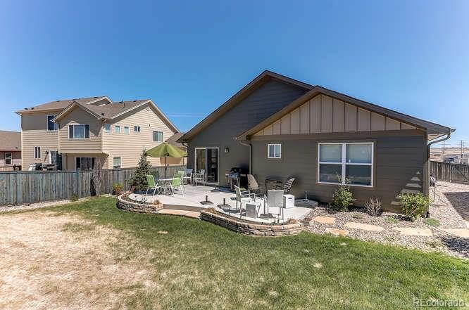 4068 Desert Ridge Circle Castle Rock, CO 80108 - Photo 23 of 25 a view of a house with backyard and sitting area