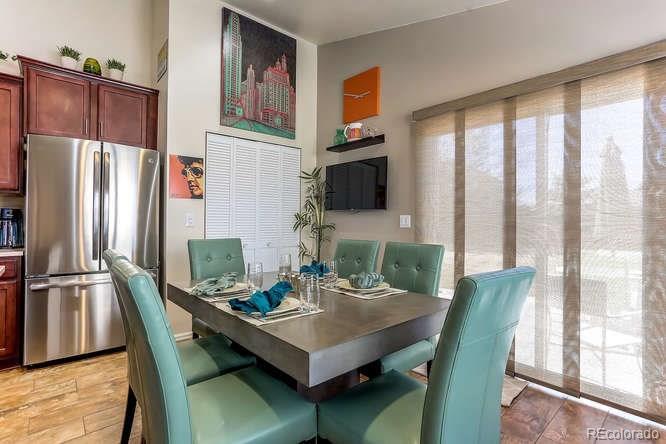 4068 Desert Ridge Circle Castle Rock, CO 80108 - Photo 10 of 25 a view of a dining room with furniture window and outside view