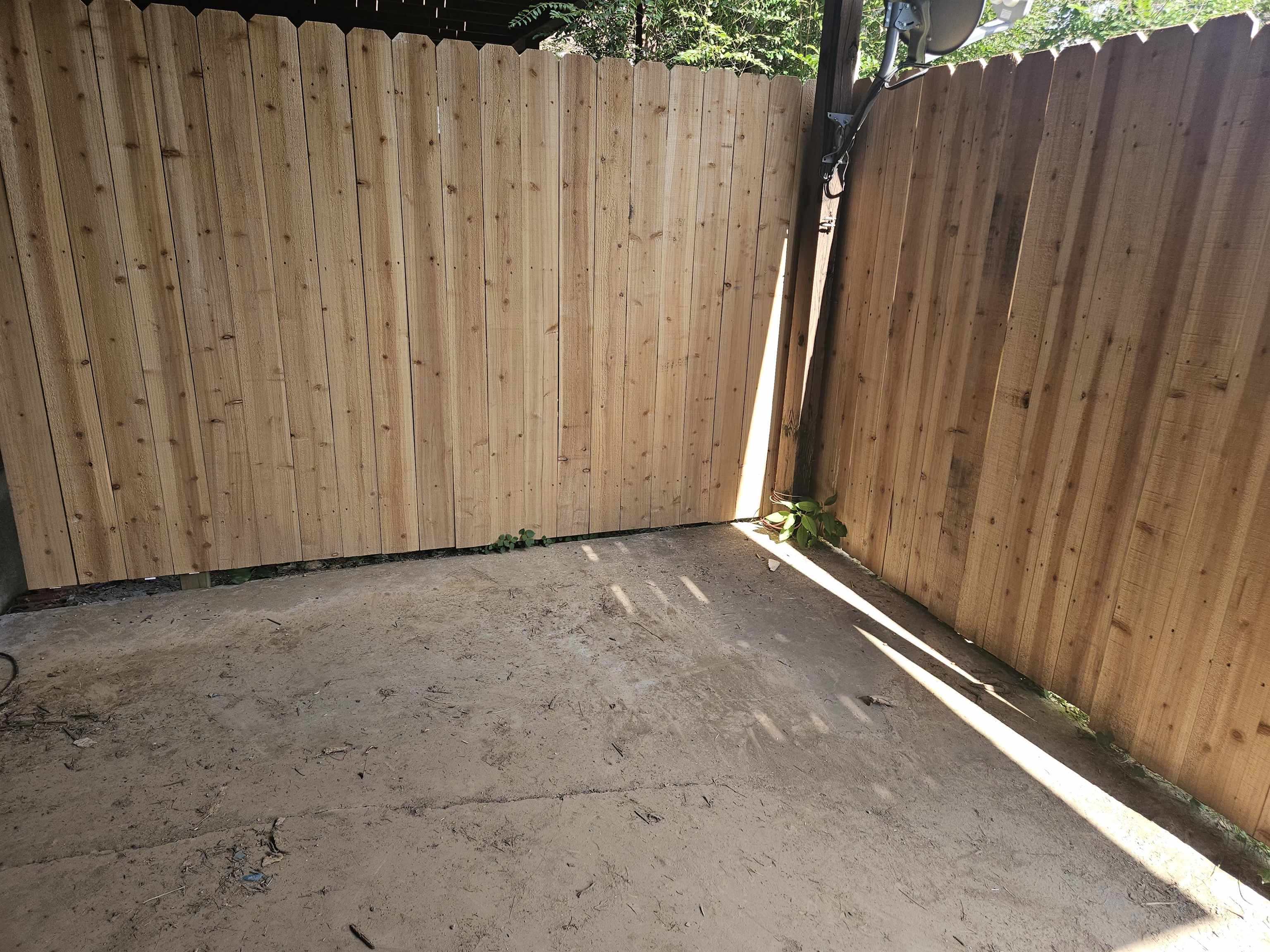 6223 Ashton Road, Unit 6223A Memphis, TN 38134 - Photo 14 of 14 a view of a storage gate with wooden fence