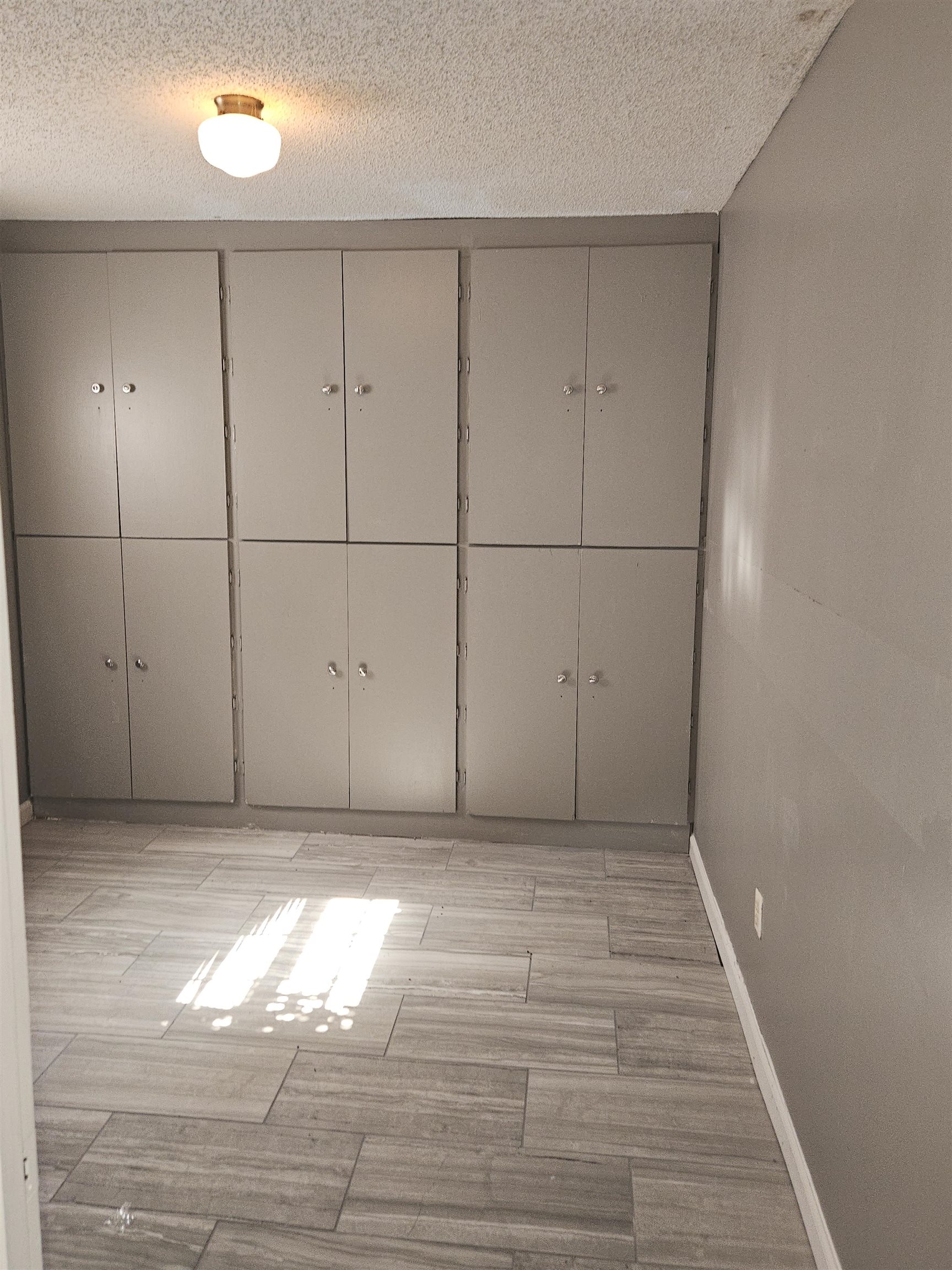 6223 Ashton Road, Unit 6223A Memphis, TN 38134 - Photo 5 of 14 a view of a livingroom with an empty space