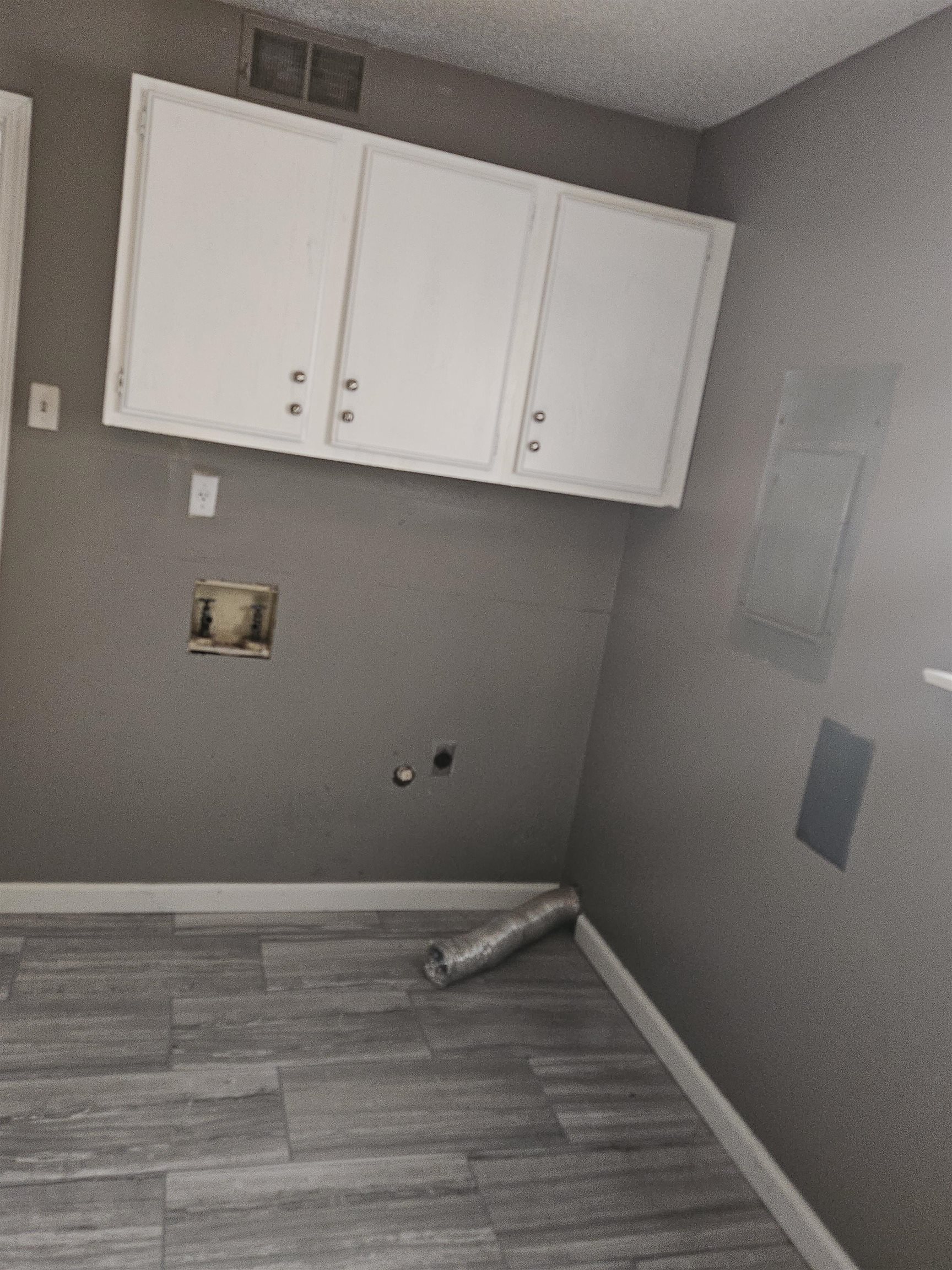 6223 Ashton Road, Unit 6223A Memphis, TN 38134 - Photo 6 of 14 a view of an empty room with wooden floor