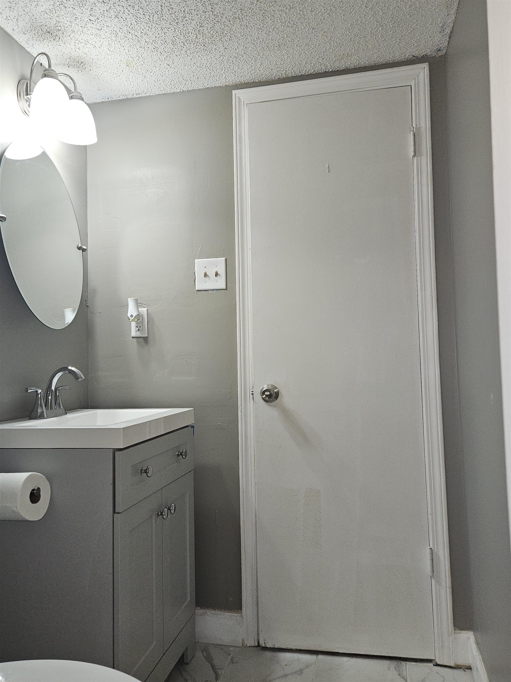6223 Ashton Road, Unit 6223A Memphis, TN 38134 - Photo 8 of 14 a bathroom with a sink and mirror