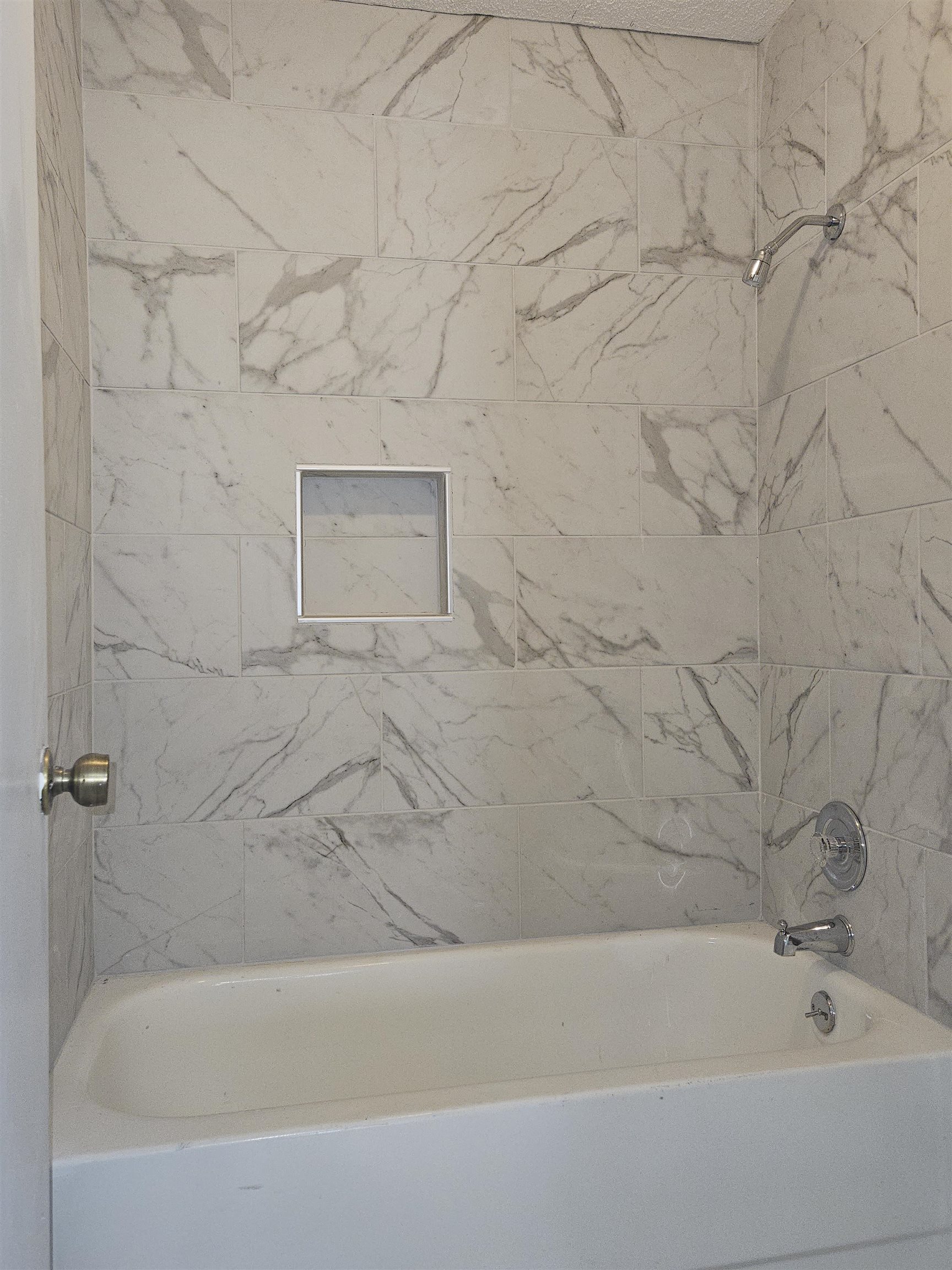 6223 Ashton Road, Unit 6223A Memphis, TN 38134 - Photo 10 of 14 a bathroom with a bathtub