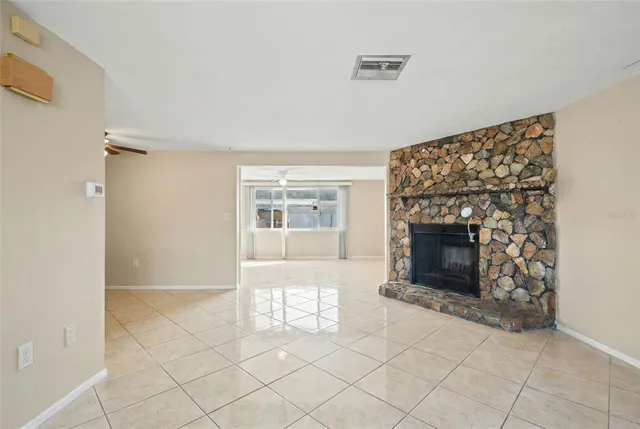 an aerial view of a house with outdoor space