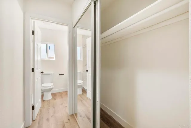 a bathroom with a granite countertop sink
