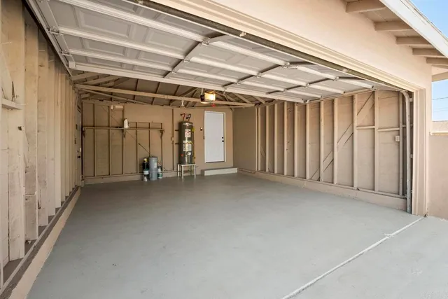 a view of a room with wooden walls