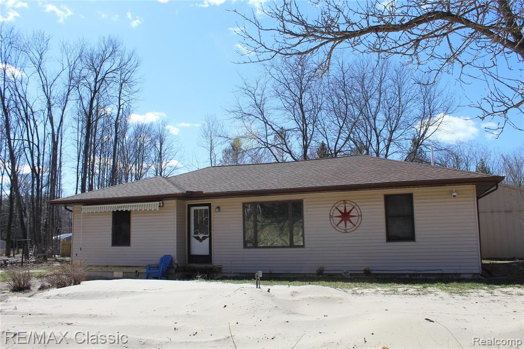 1199 Radov Road Gladwin, MI 48624 - Photo 1 of 55