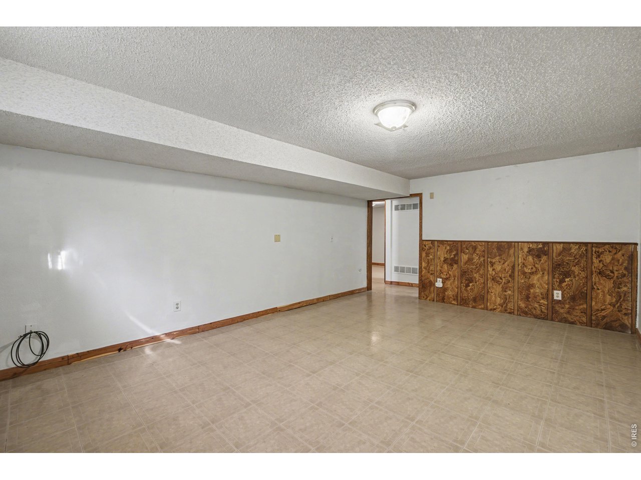 3711 West 7th Street Road Greeley, CO 80634 - Photo 24 of 39 Large rec room in the basement