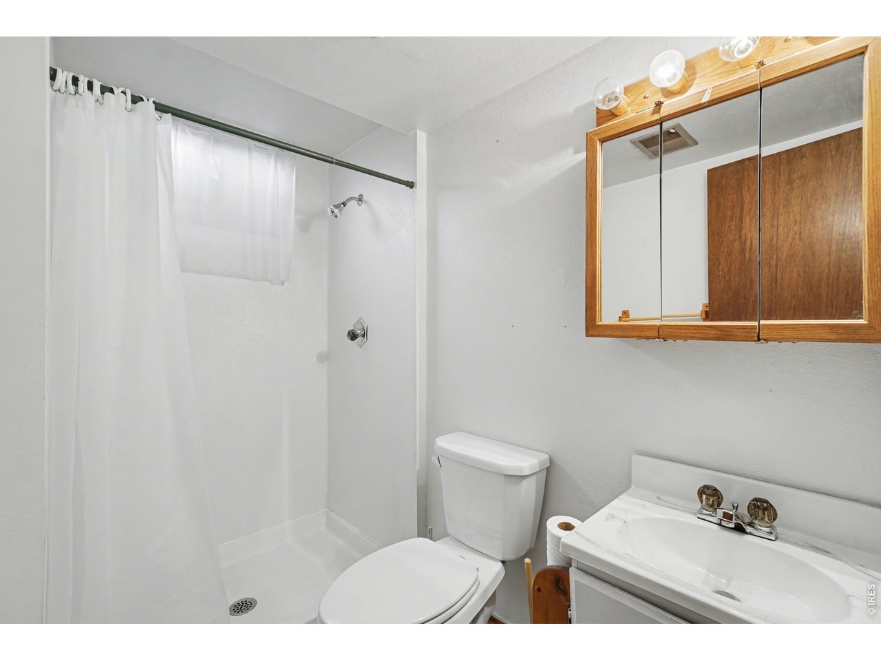 3711 West 7th Street Road Greeley, CO 80634 - Photo 26 of 39 Basement bathroom is clean and bright