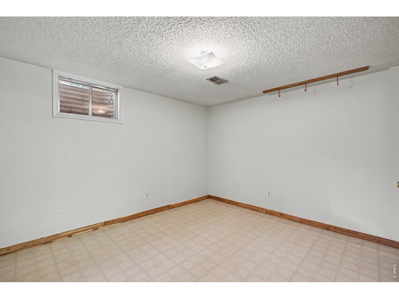3711 West 7th Street Road Greeley, CO 80634 - Photo 27 of 39 Bonus room in the basement - could be used for office, crafts, yoga