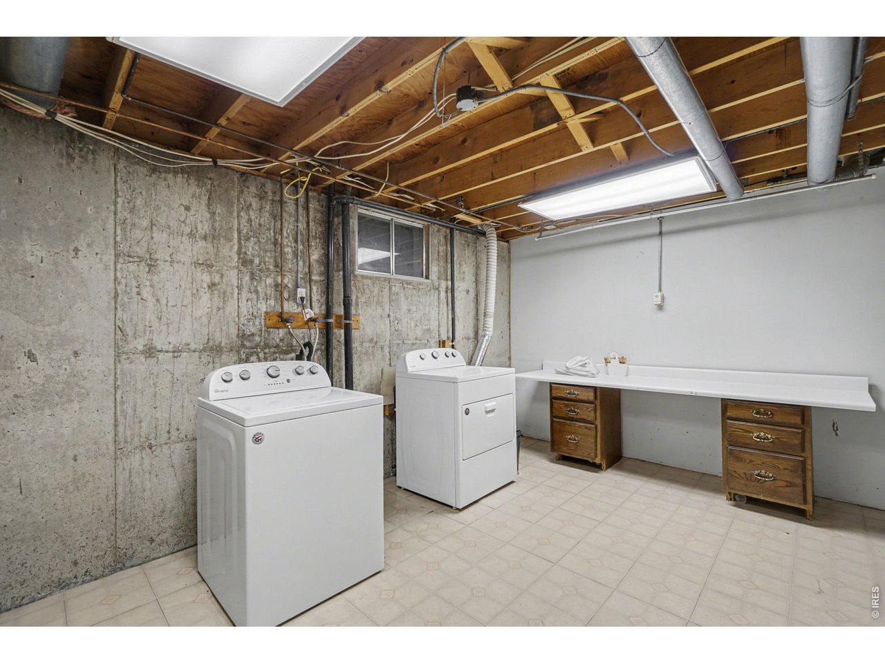 3711 West 7th Street Road Greeley, CO 80634 - Photo 29 of 39 Huge laundry room - washer and dryer stay with the home!