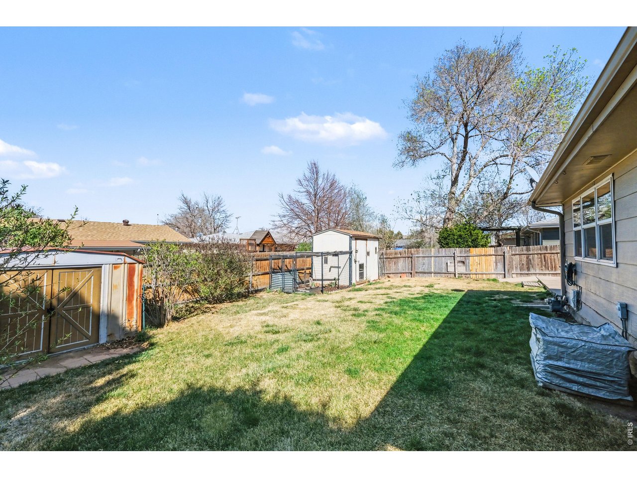 3711 West 7th Street Road Greeley, CO 80634 - Photo 35 of 39 Large fenced back yard with two sheds