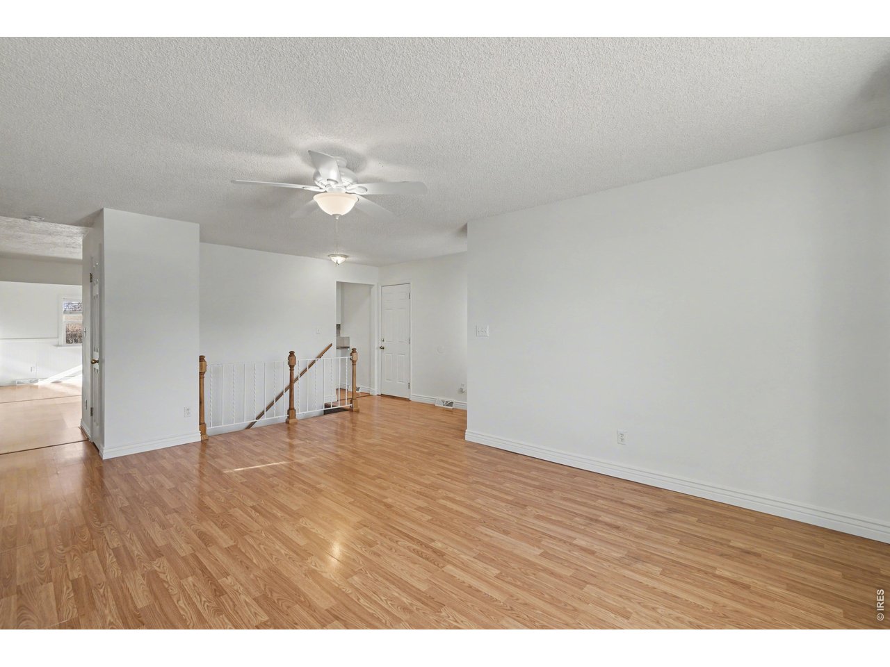 3711 West 7th Street Road Greeley, CO 80634 - Photo 6 of 39 Head back through the hallway to find the amazing heart of the home!