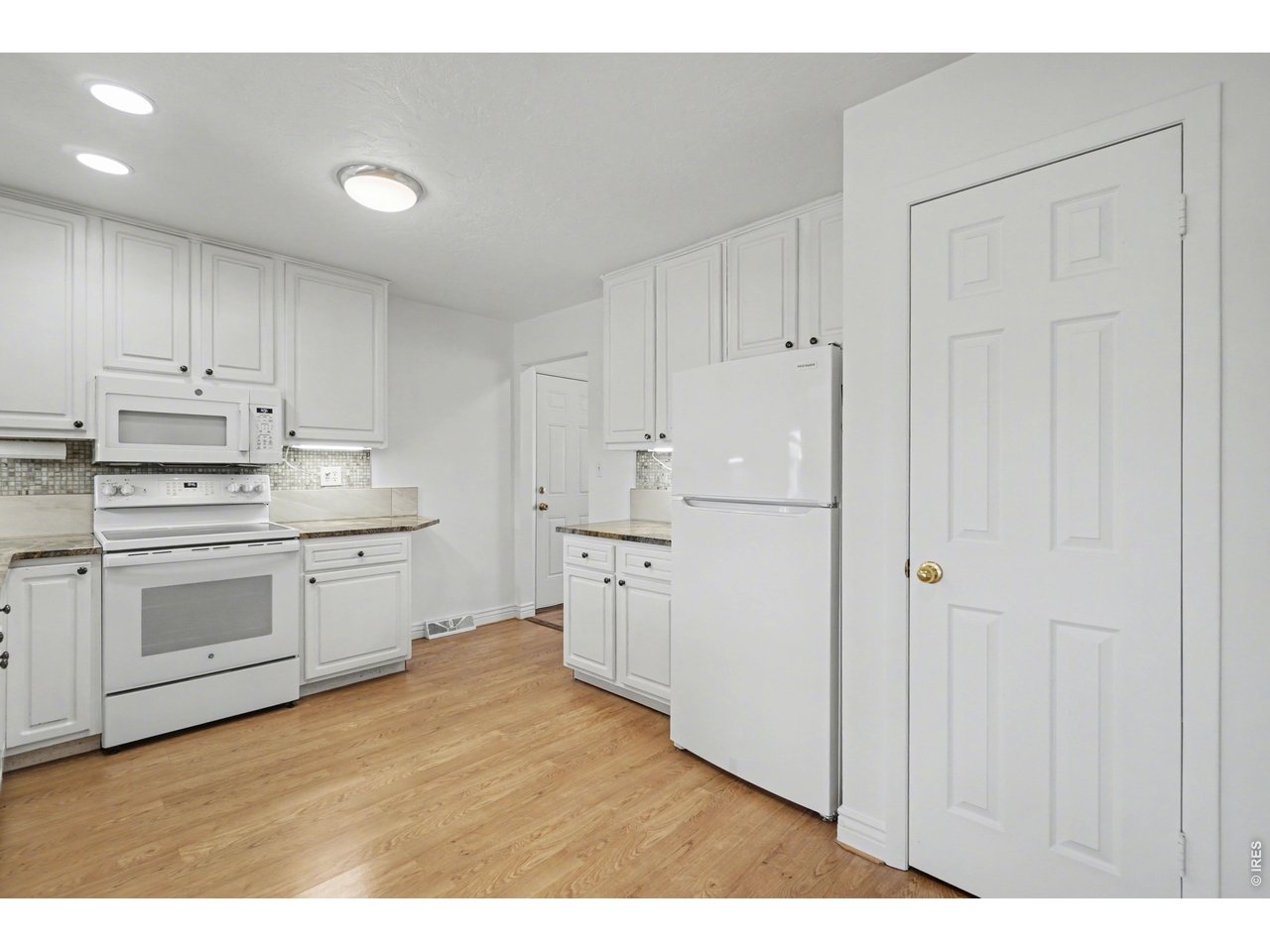 3711 West 7th Street Road Greeley, CO 80634 - Photo 9 of 39 Updated refrigerator, range/oven and microwave