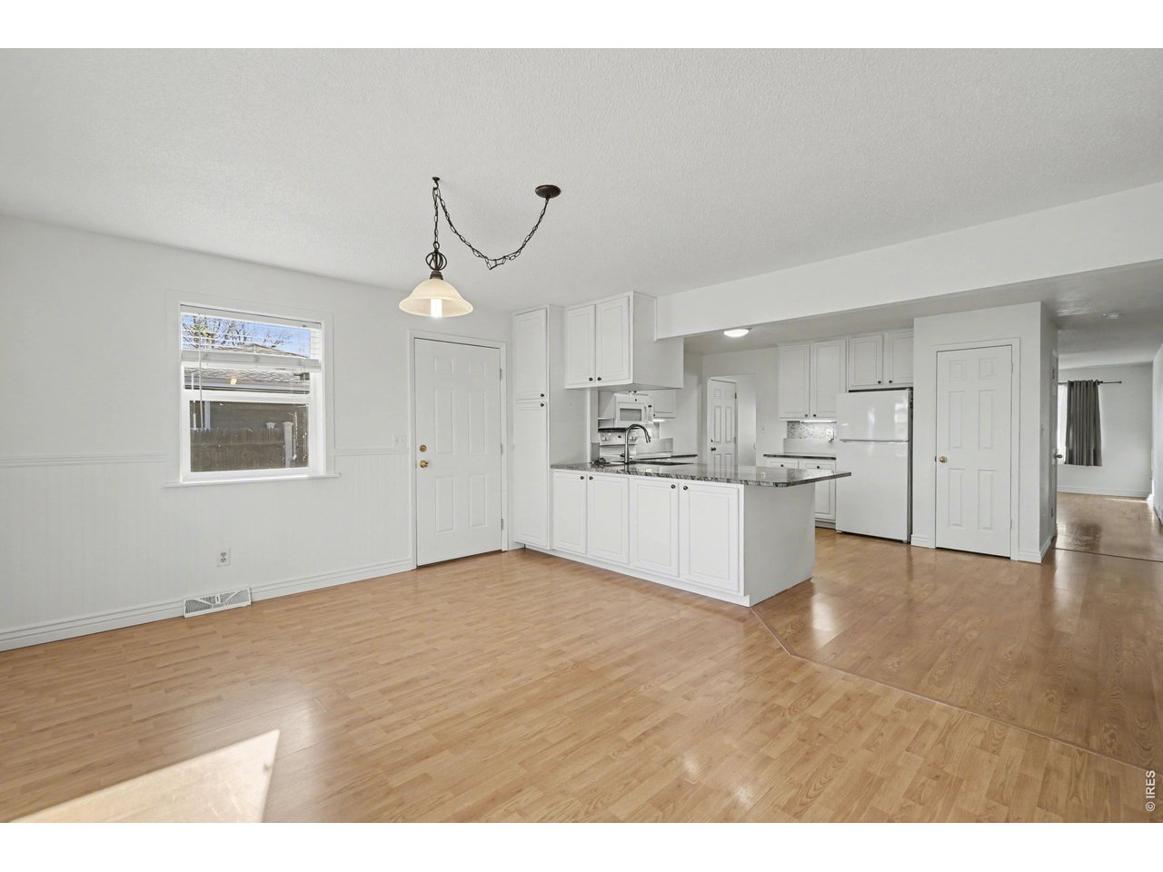 3711 West 7th Street Road Greeley, CO 80634 - Photo 10 of 39 Dining room has access to back patio and yard