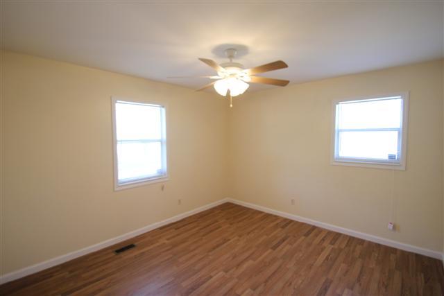90 Winnie Boynton Road Manchester, TN 37355 - Photo 15 of 20 a view of a room with wooden floor and a window