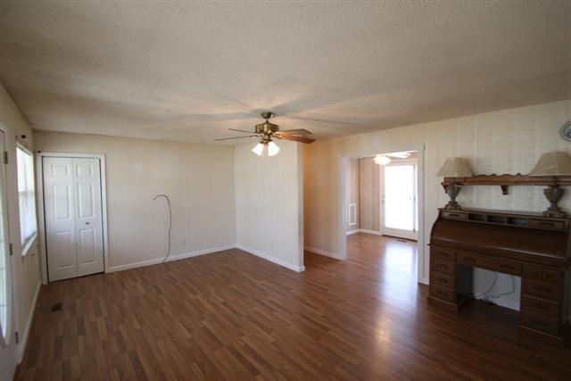 90 Winnie Boynton Road Manchester, TN 37355 - Photo 5 of 20 a view of a livingroom with wooden floor